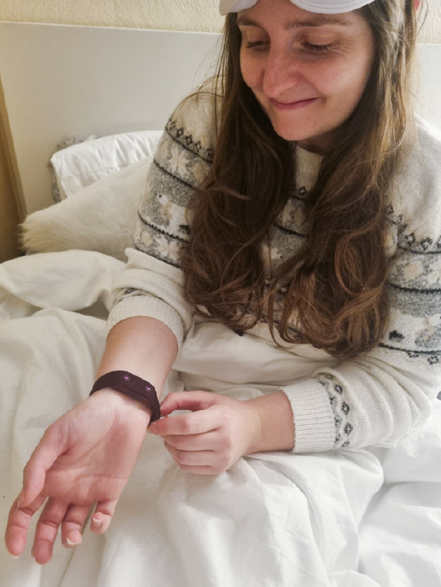Iona wearing the NC° Band in bed