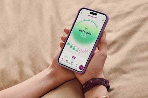 Phone with the Natural Cycles app showing the Not fertile screen