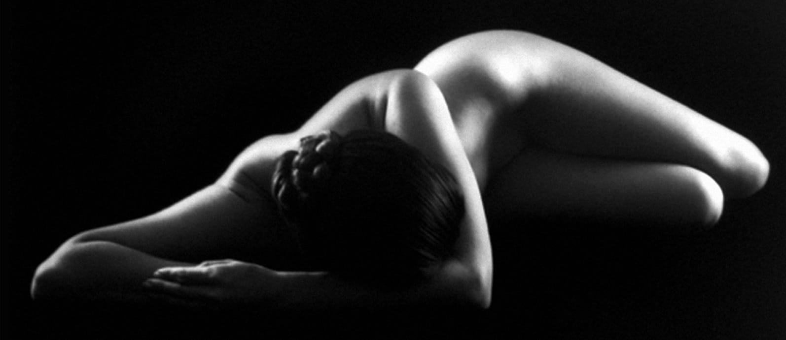 nude woman laying down