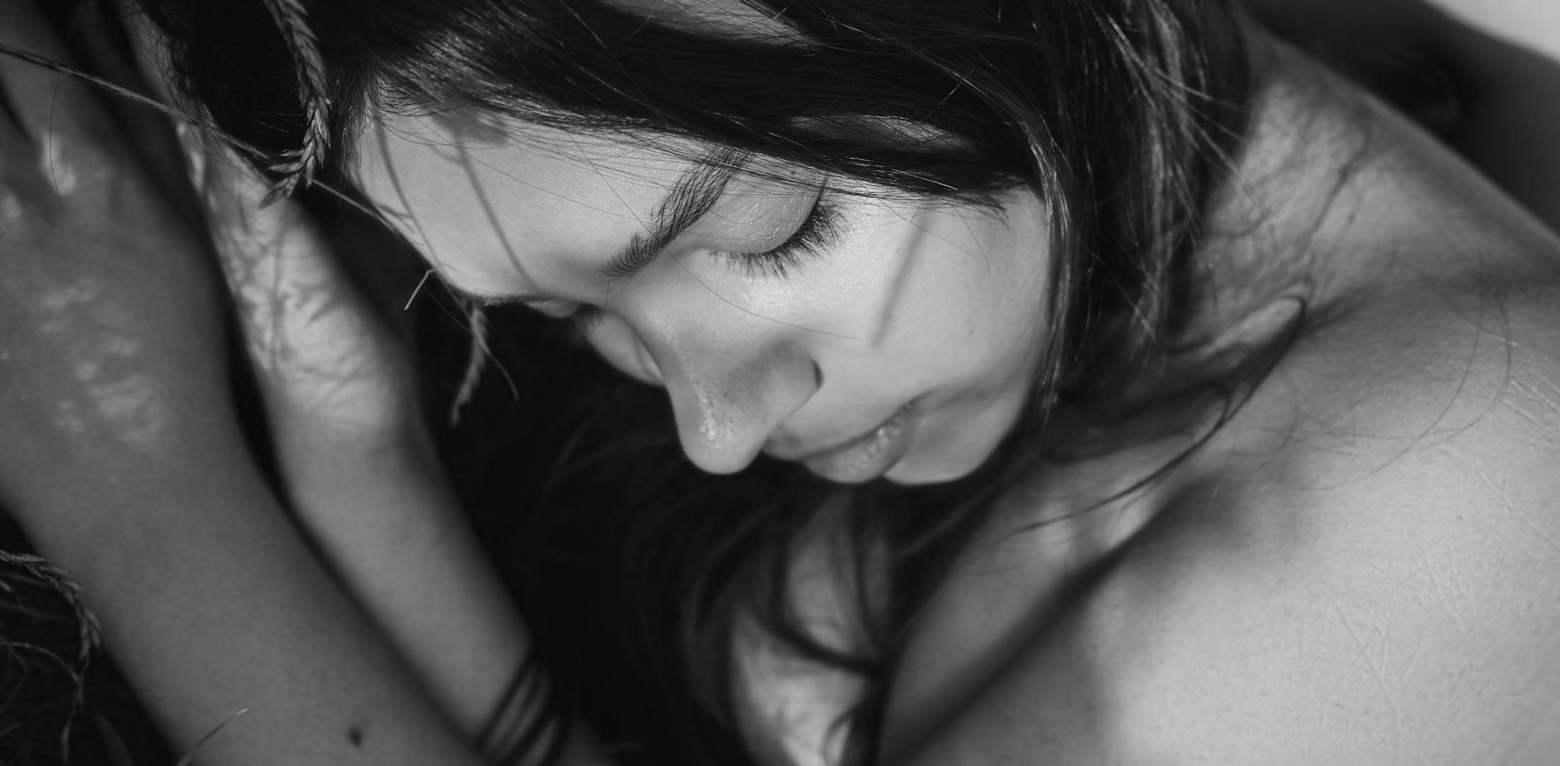 woman closing her eyes