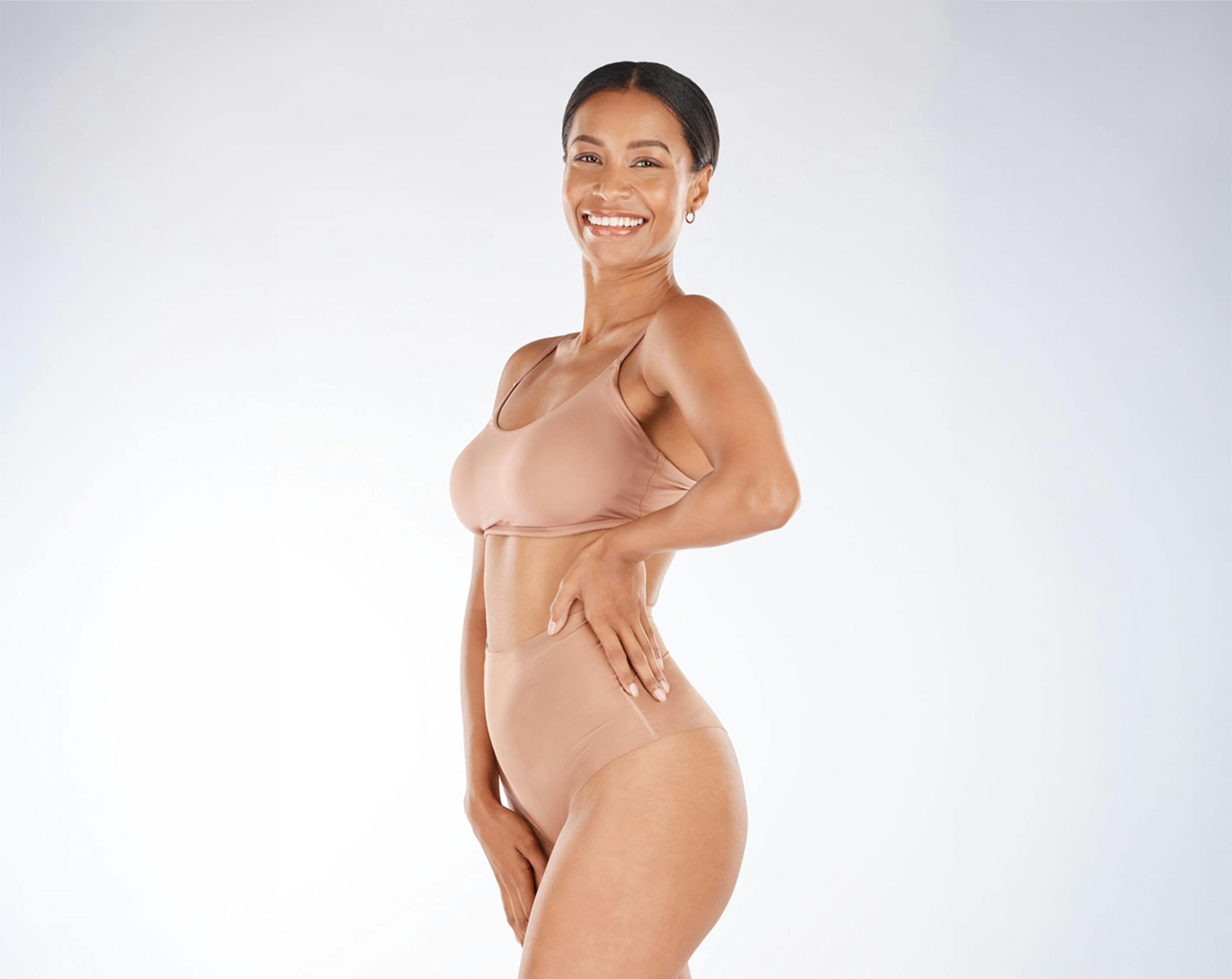 woman in beige undergarments