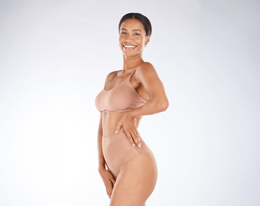 woman in beige undergarments