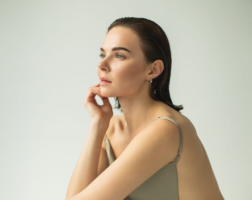 woman with her hair slicked back