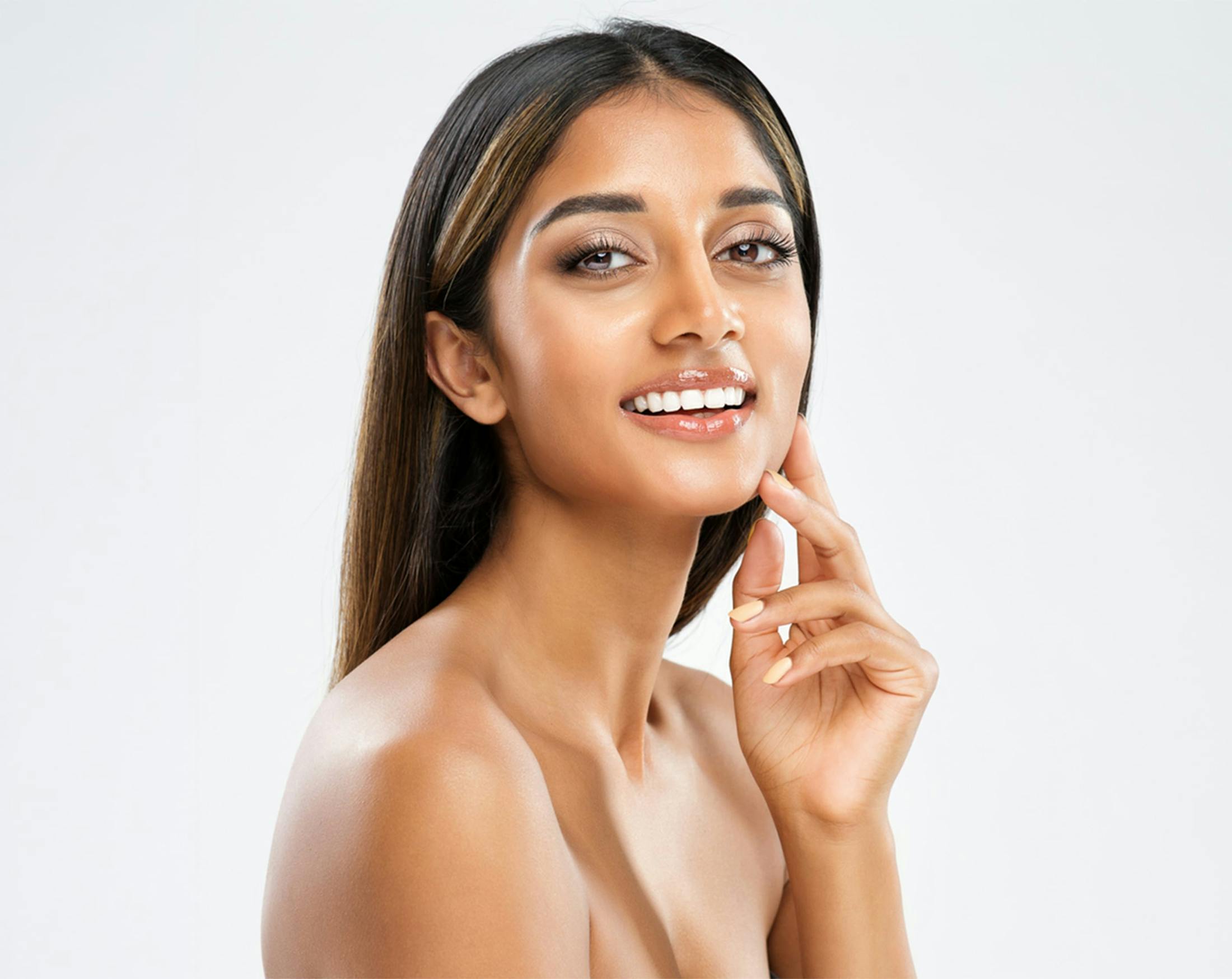 woman touching her jaw