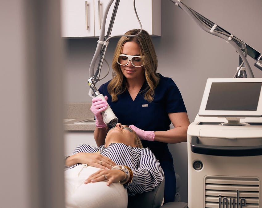aesthetician providing skin treatment