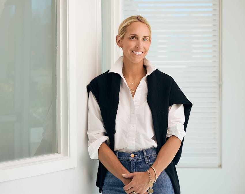 woman wearing a white button up shirt