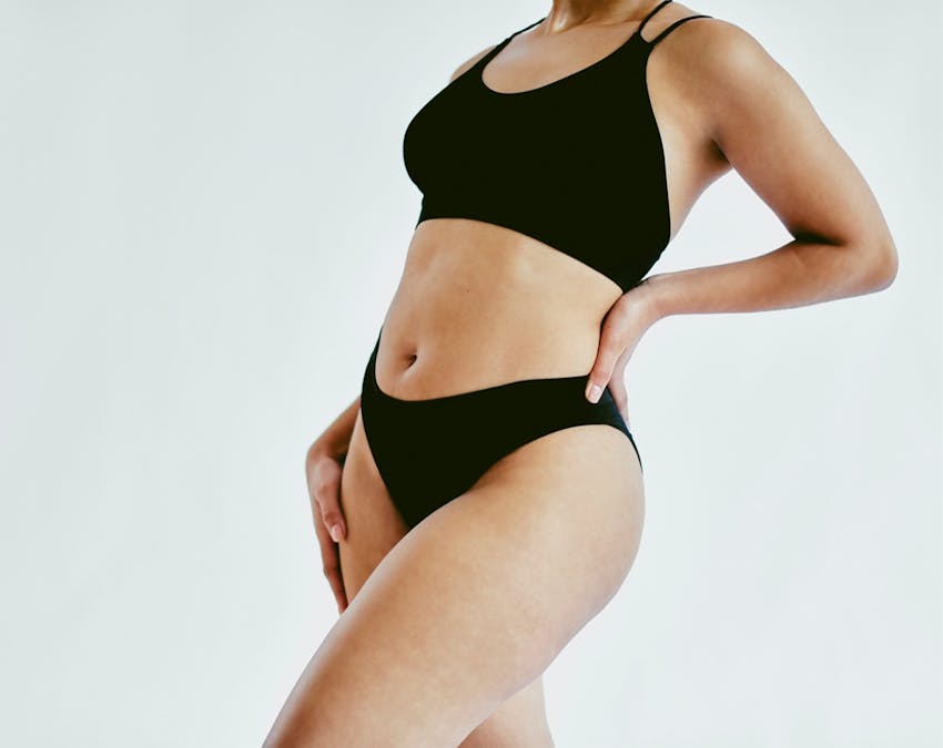 woman in black undergarments