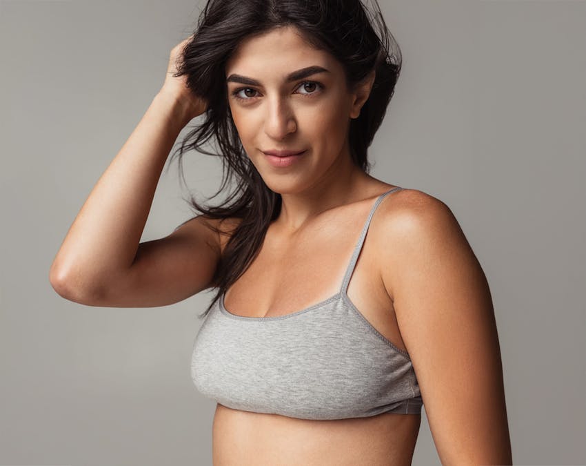 woman in grey top