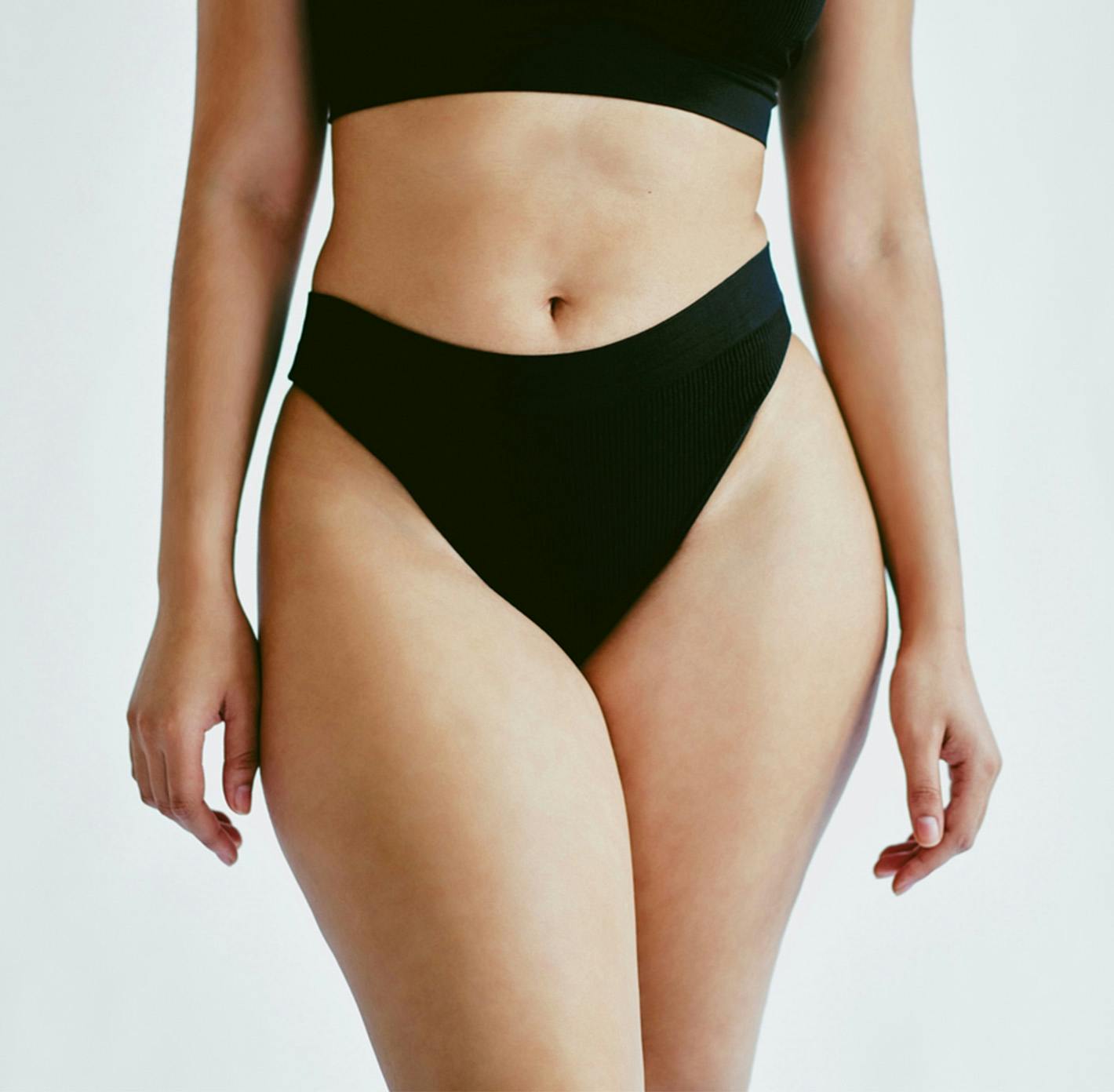 woman in black undergarments