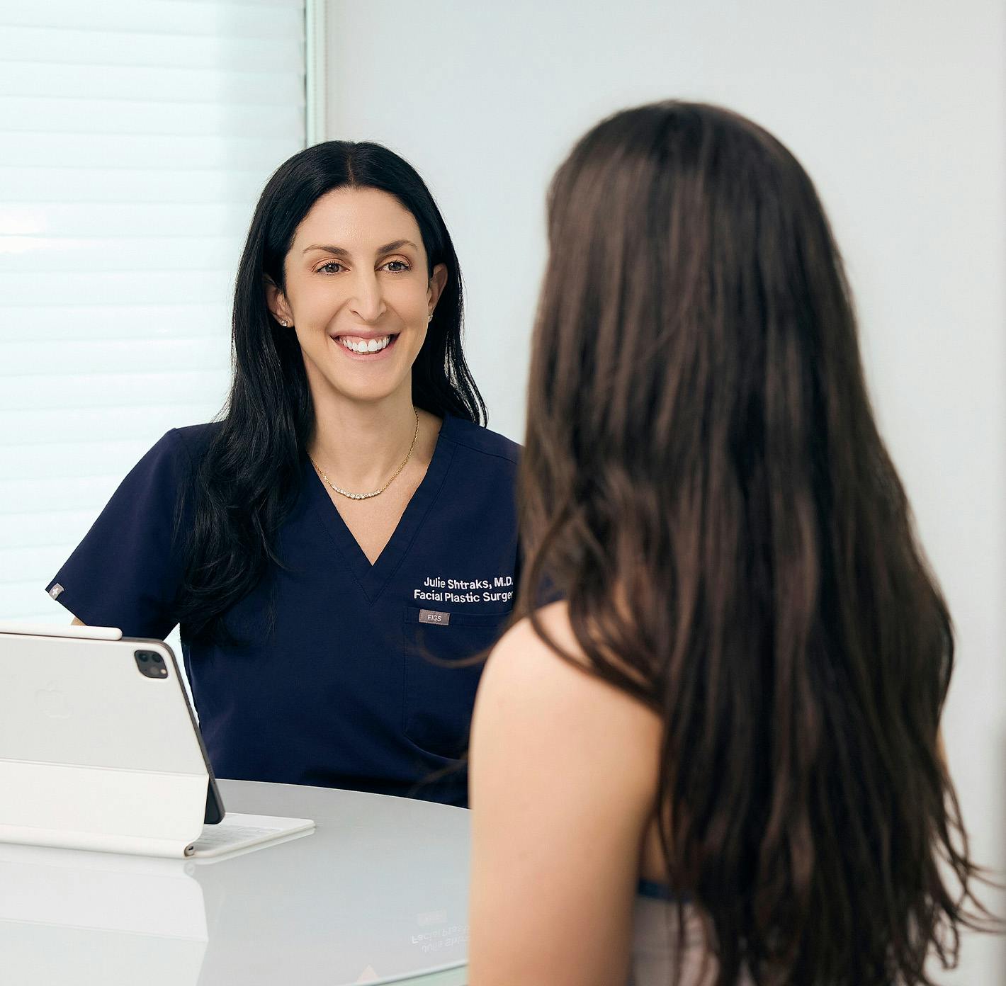 doctor and patient speaking
