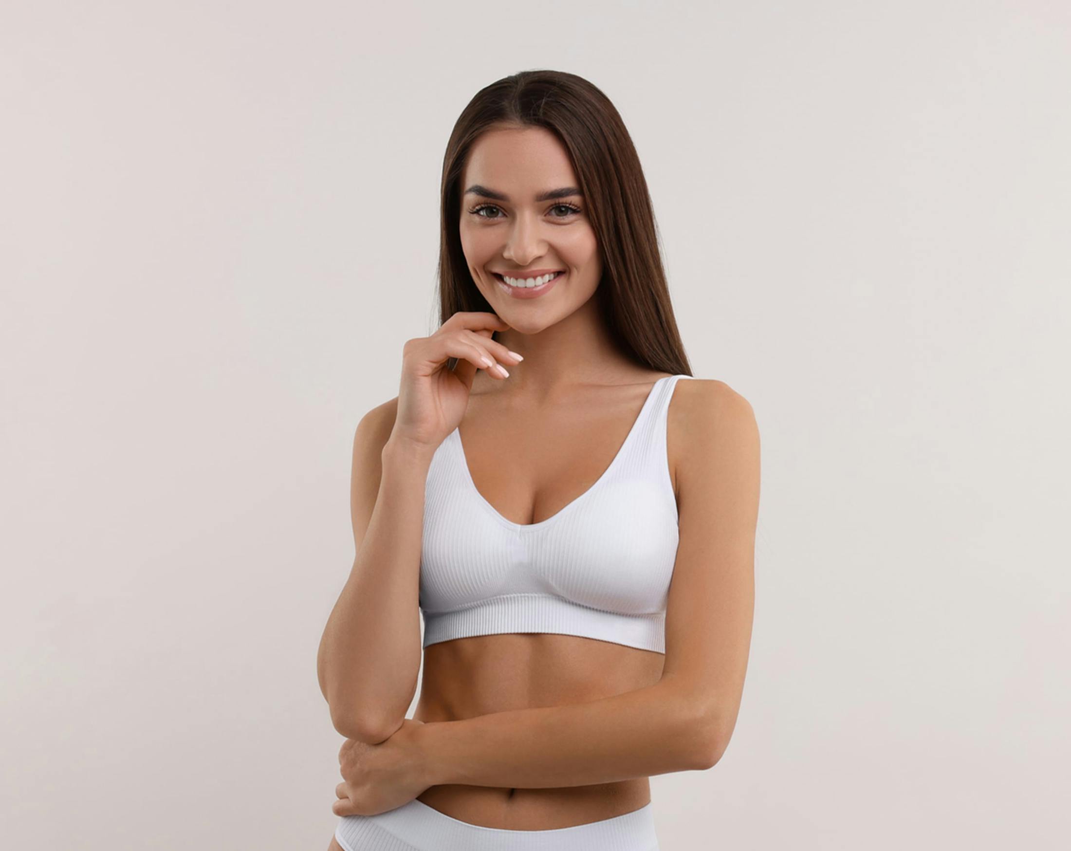 woman getting her chest measured