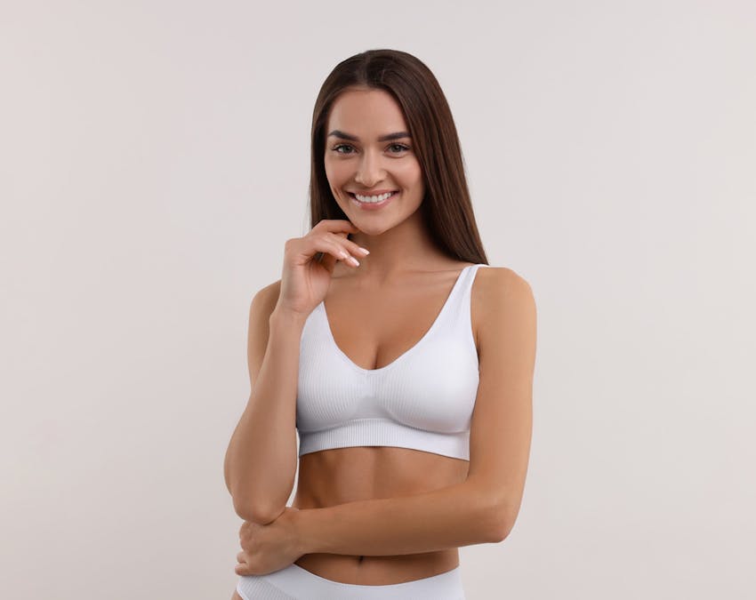 woman getting her chest measured
