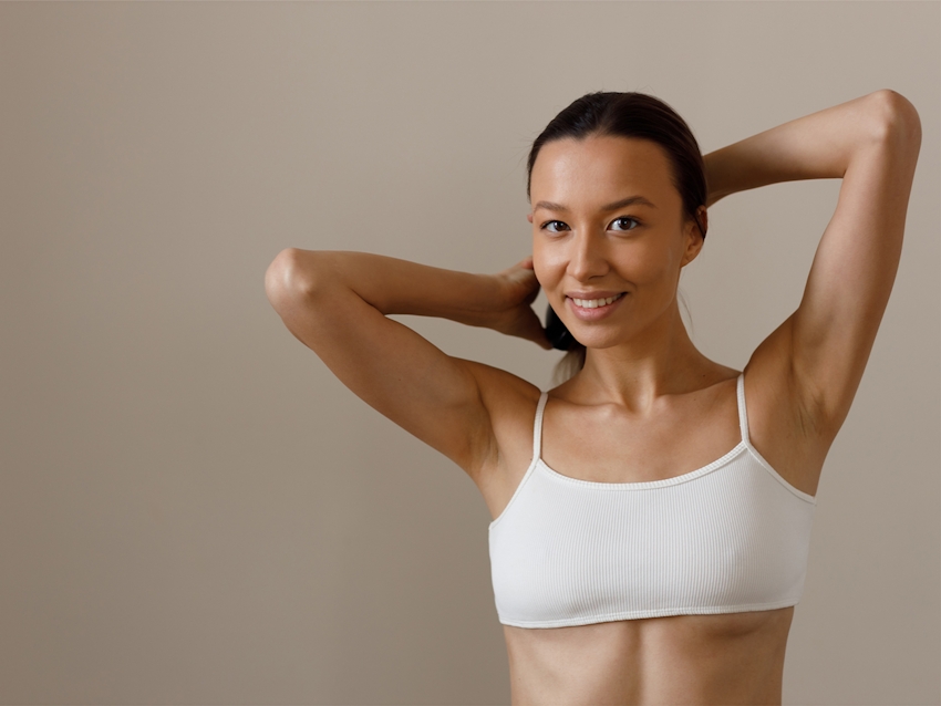 women putting her hair back