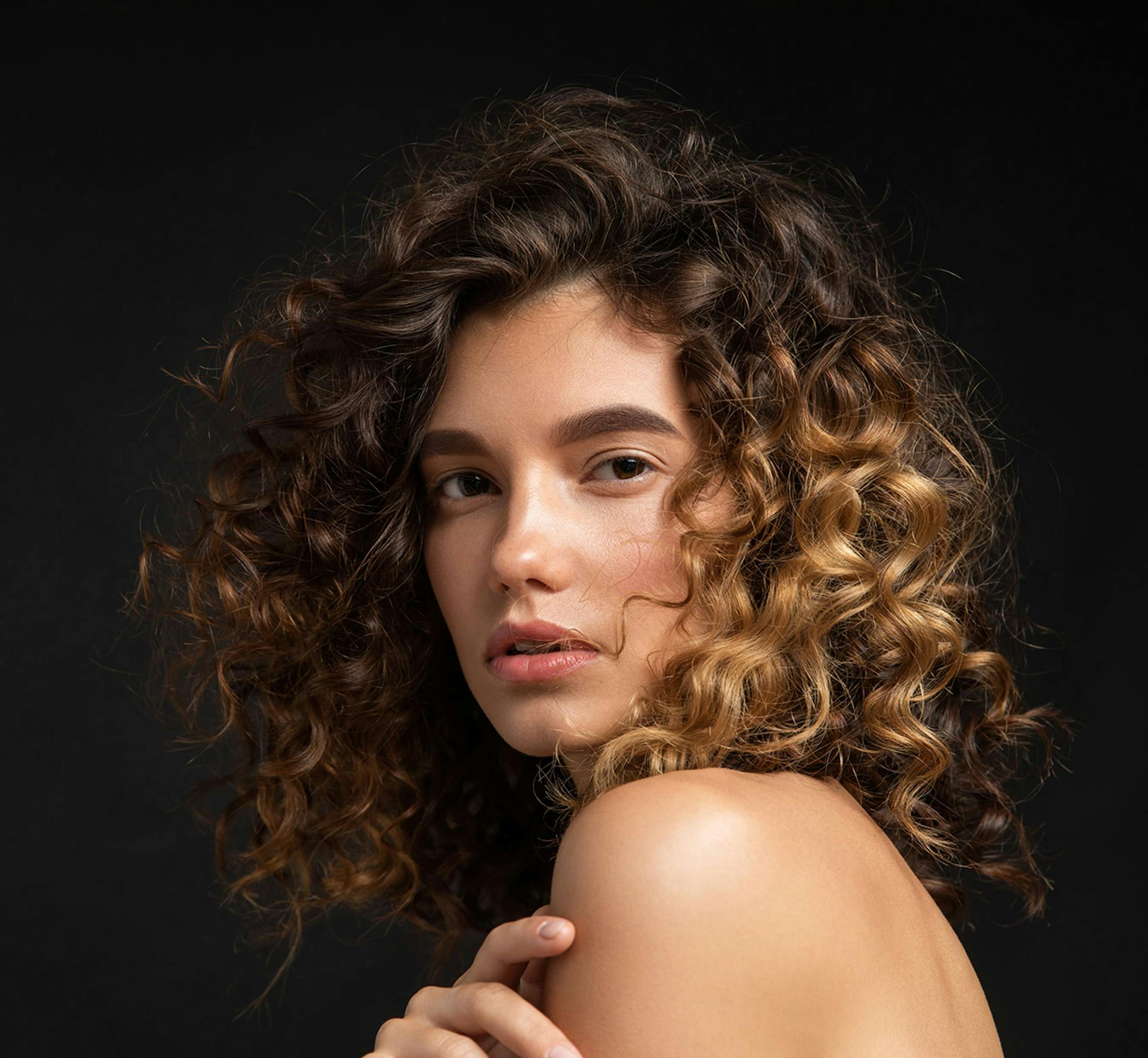 Woman looking over her shoulder