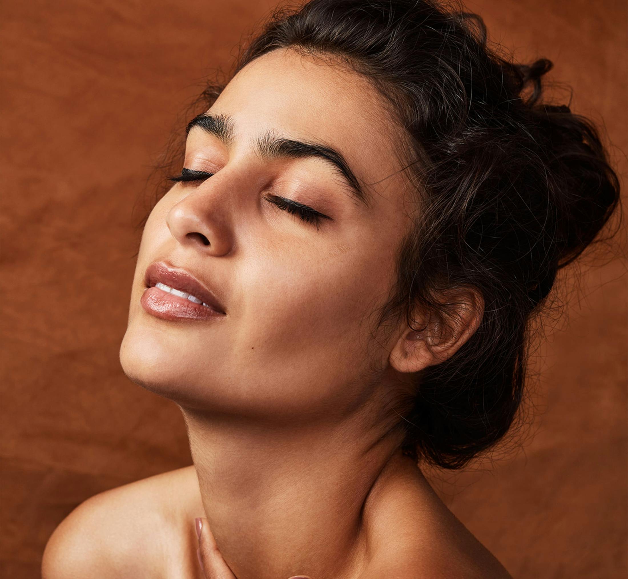 Woman with her eyes closed