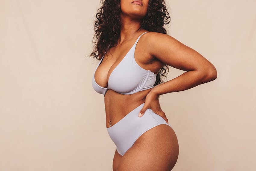 woman with her hands on her hips