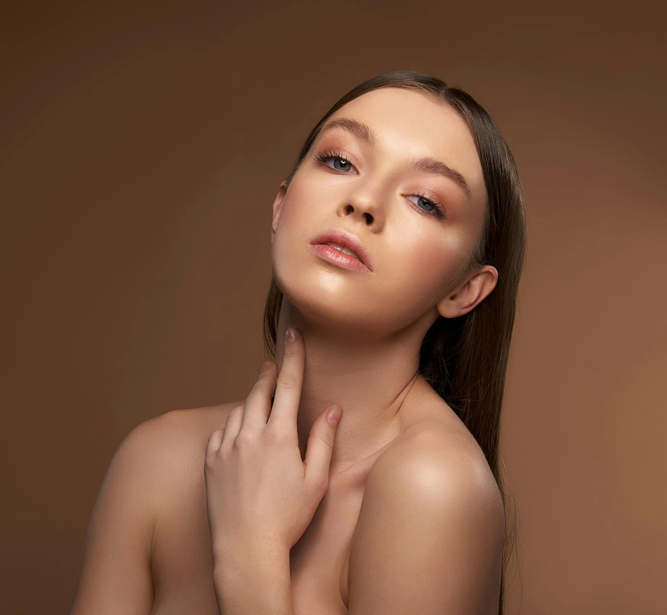 Woman touching her neck