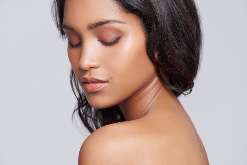women looking down at her shoulder