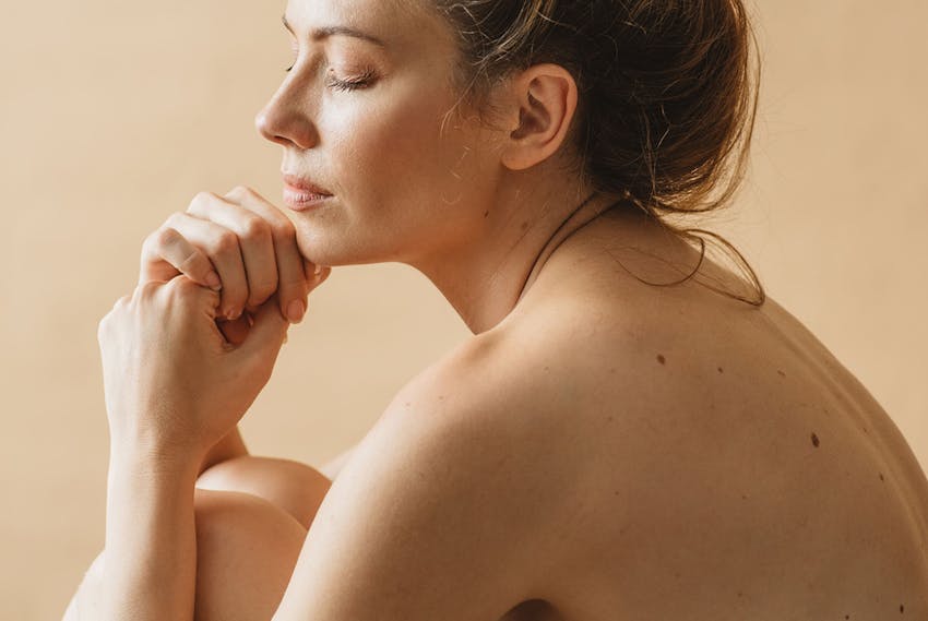 Woman touching her chin