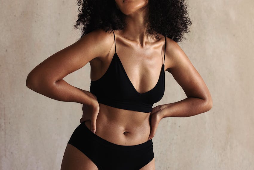 woman with her hands on her hips