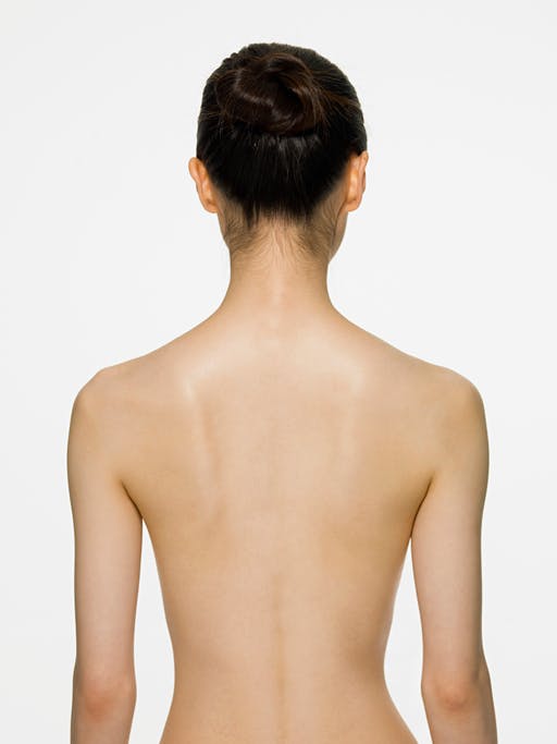 Woman with her hair up in a bun