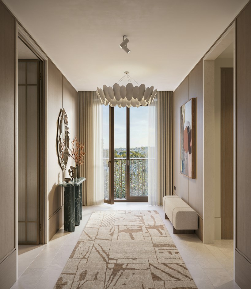 Hallway of St John's Wood Square's luxury apartments in London, with a sculptural pendant light, marble console, and full-height balcony doors.
