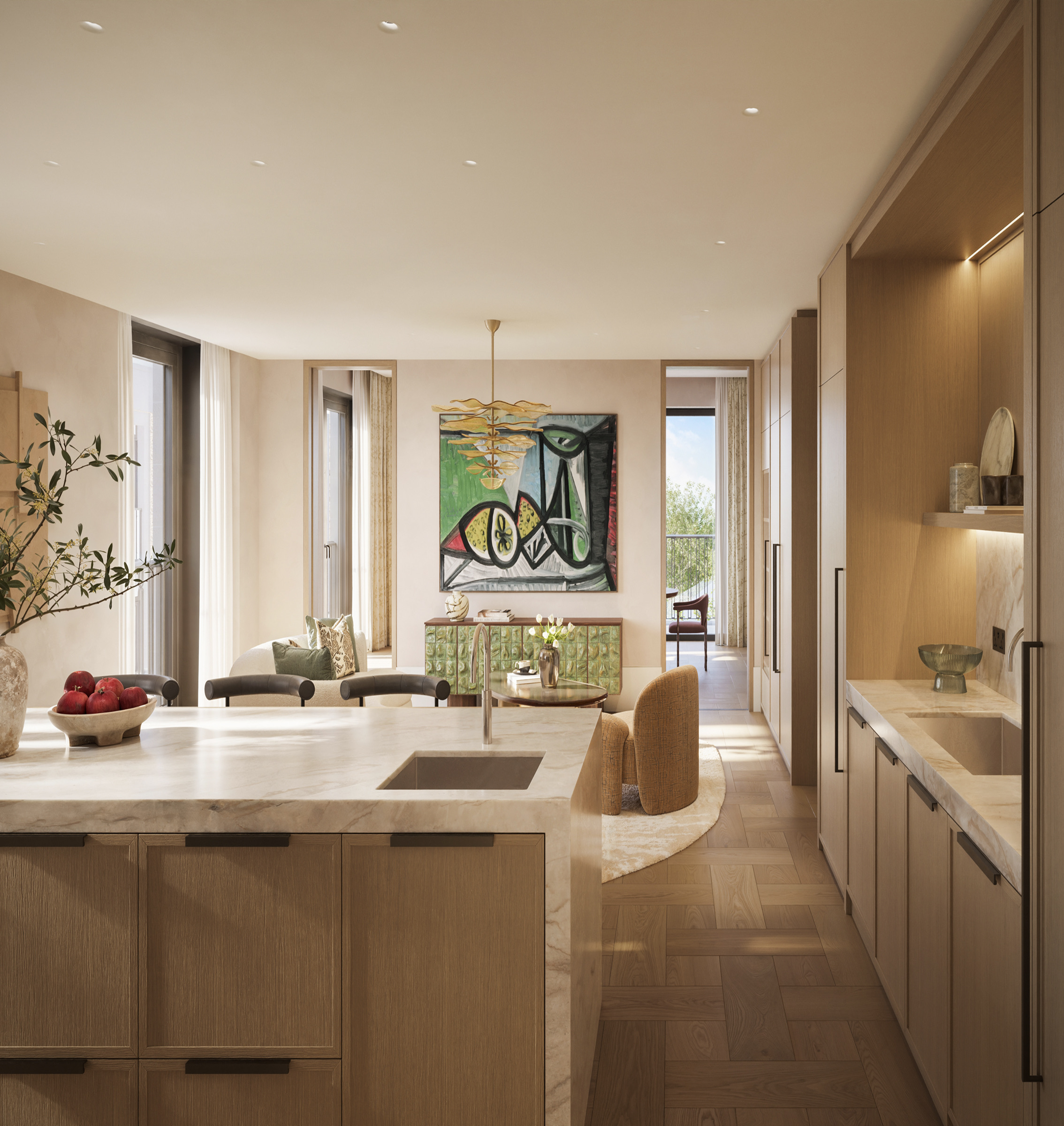Kitchen with a marble island, oak cabinetry and herringbone floor in a St John's Wood Square apartment