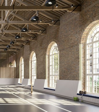 Indoor tennis court with timber roof trusses and arched windows at The Riding School, for St. John's Wood Square residents.