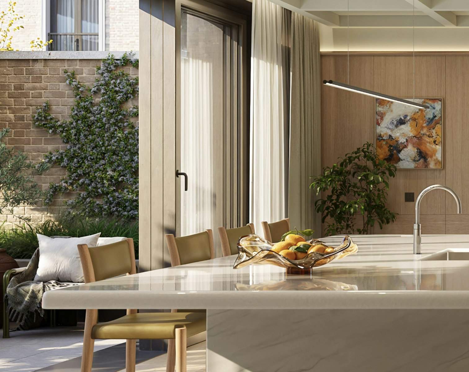 Kitchen island with four chairs in a luxury townhouse in London, with full-height glazed doors opening onto a planted garden