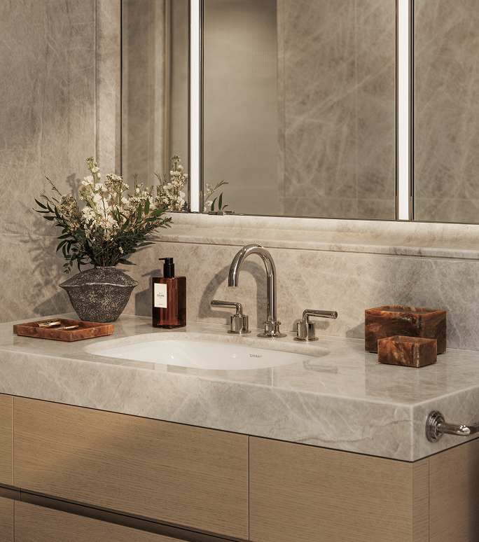 Principal bathroom with stone surfaces, timber joinery and a mirror above the tap, in a luxury apartment in London for sale.