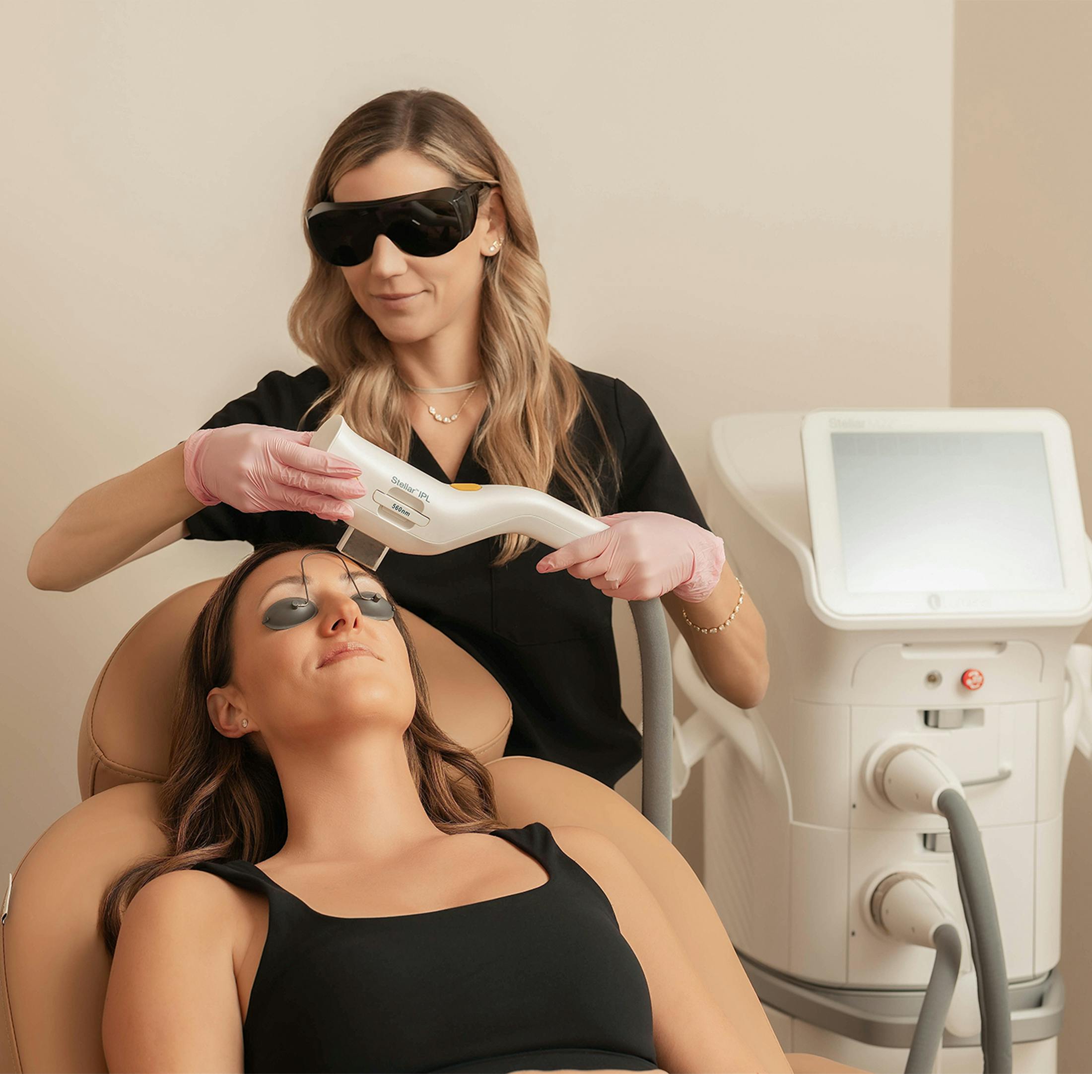 Doctor preforming a laser treatment