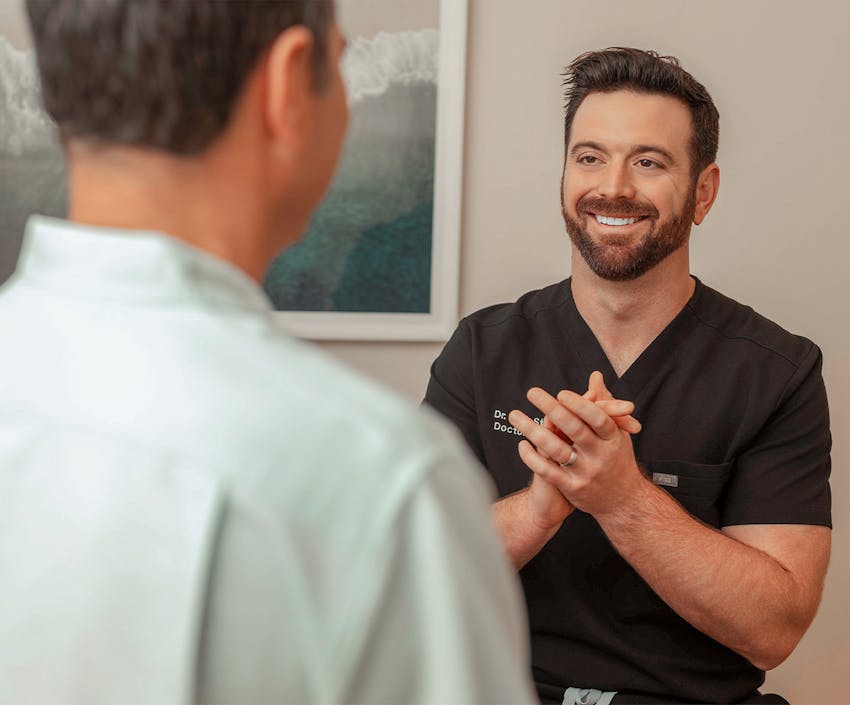 Doctor helping a patient