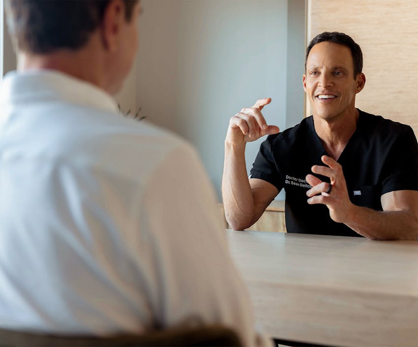 A doctor talking to a patient