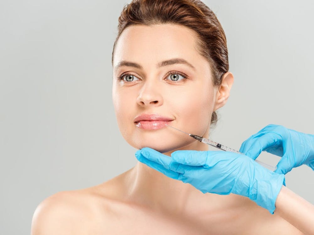woman getting lip injection