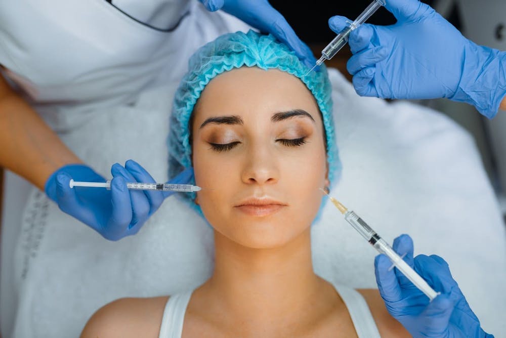 woman getting injections