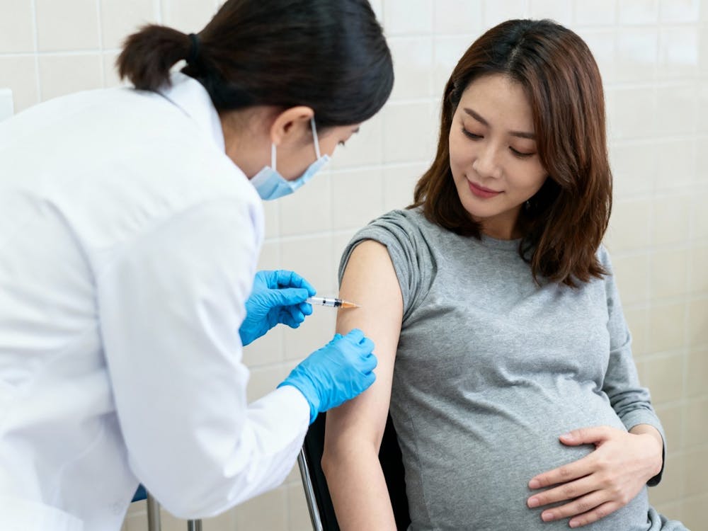 pregnant woman getting injection