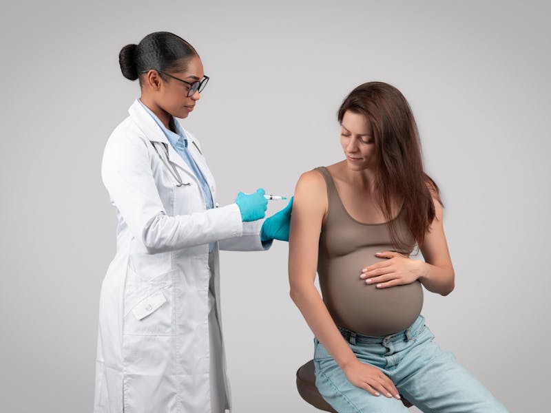 pregnant woman getting injection