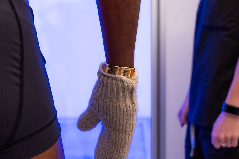 A man is about to enter the Cryochamber at Lume for Cryotherapy near Lincoln Park Chicago.
