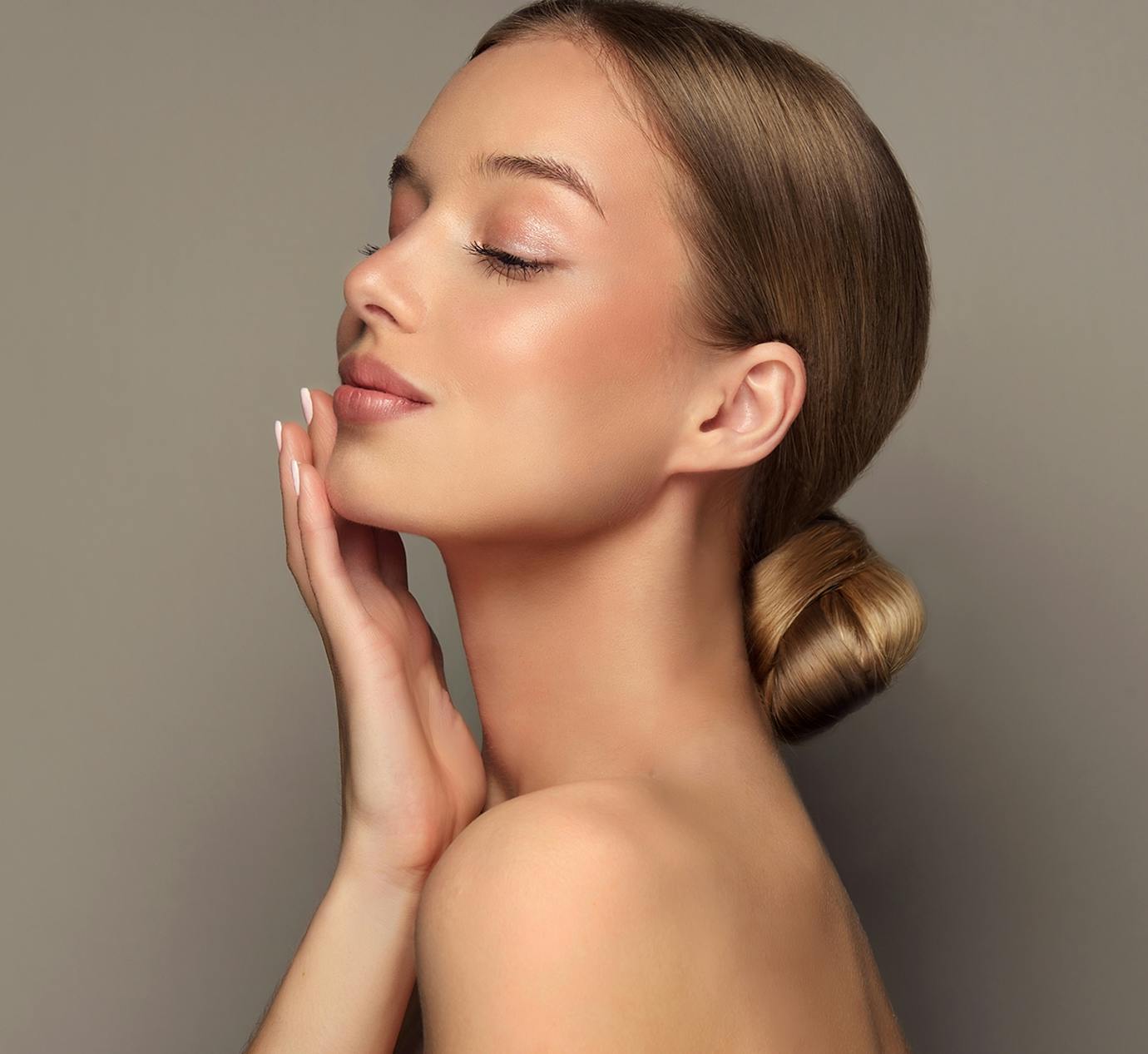woman touching face