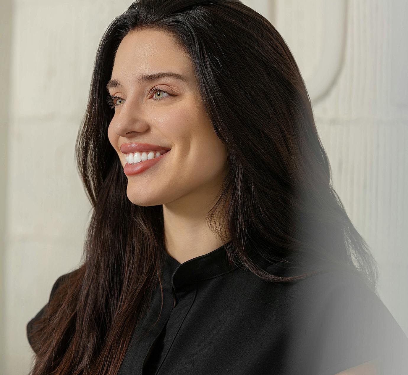 woman looking over smiling