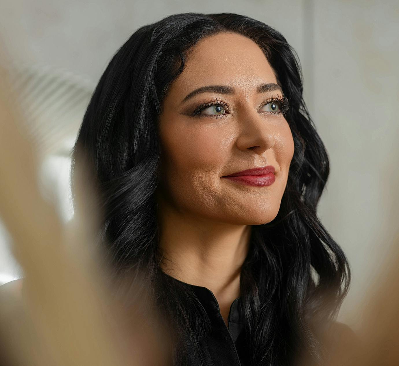 woman looking over smiling
