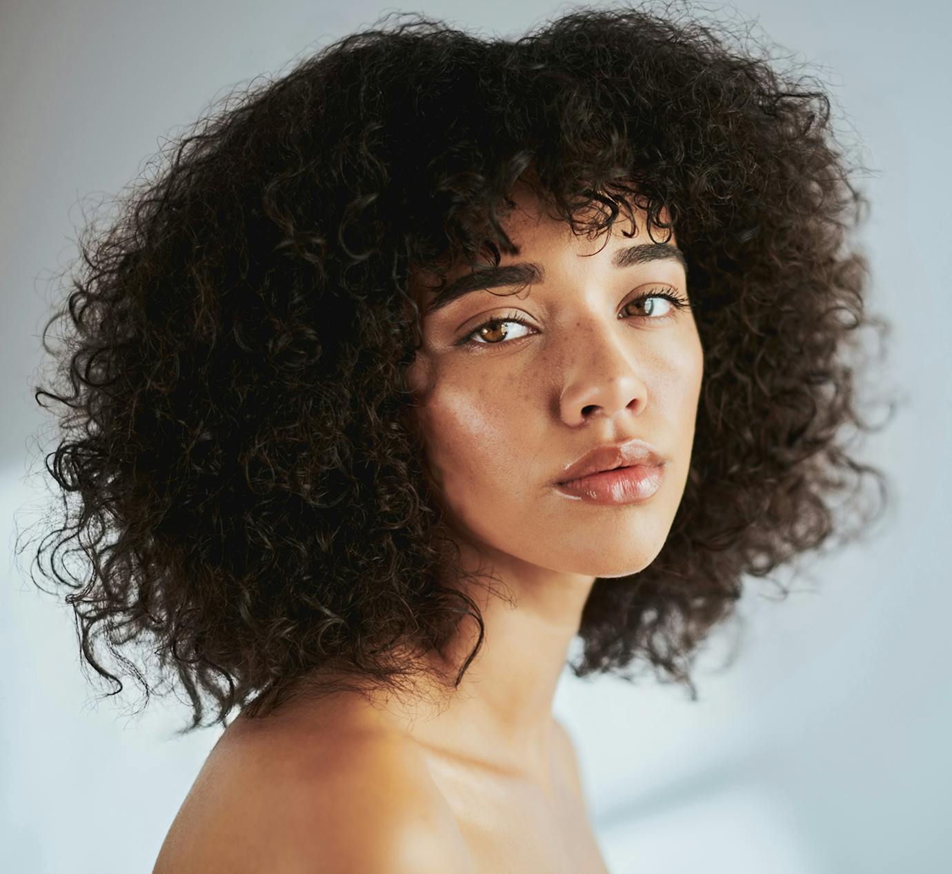 woman looking over shoulder