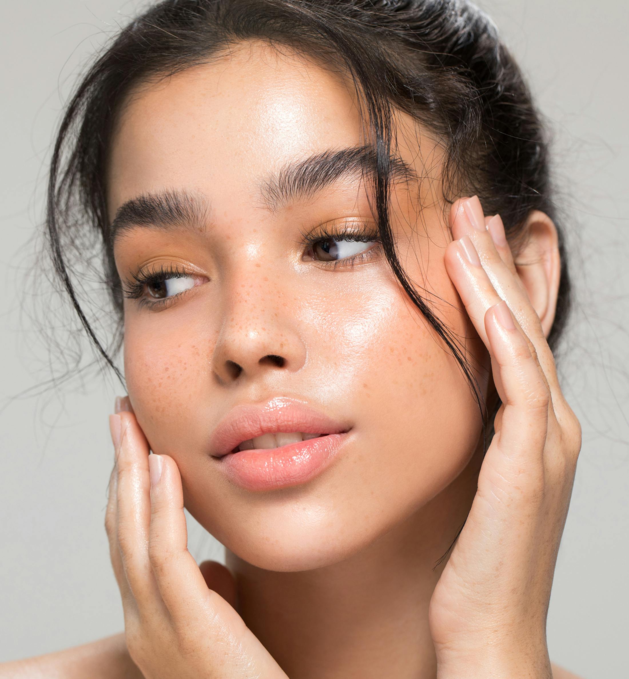 woman touching face