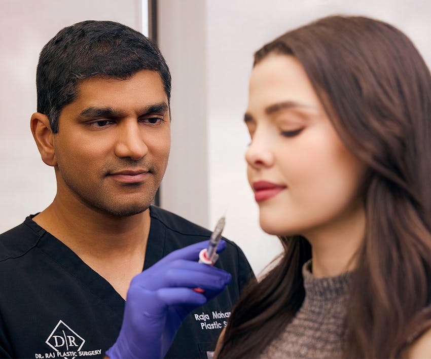 Dr. Mohan about to give injections