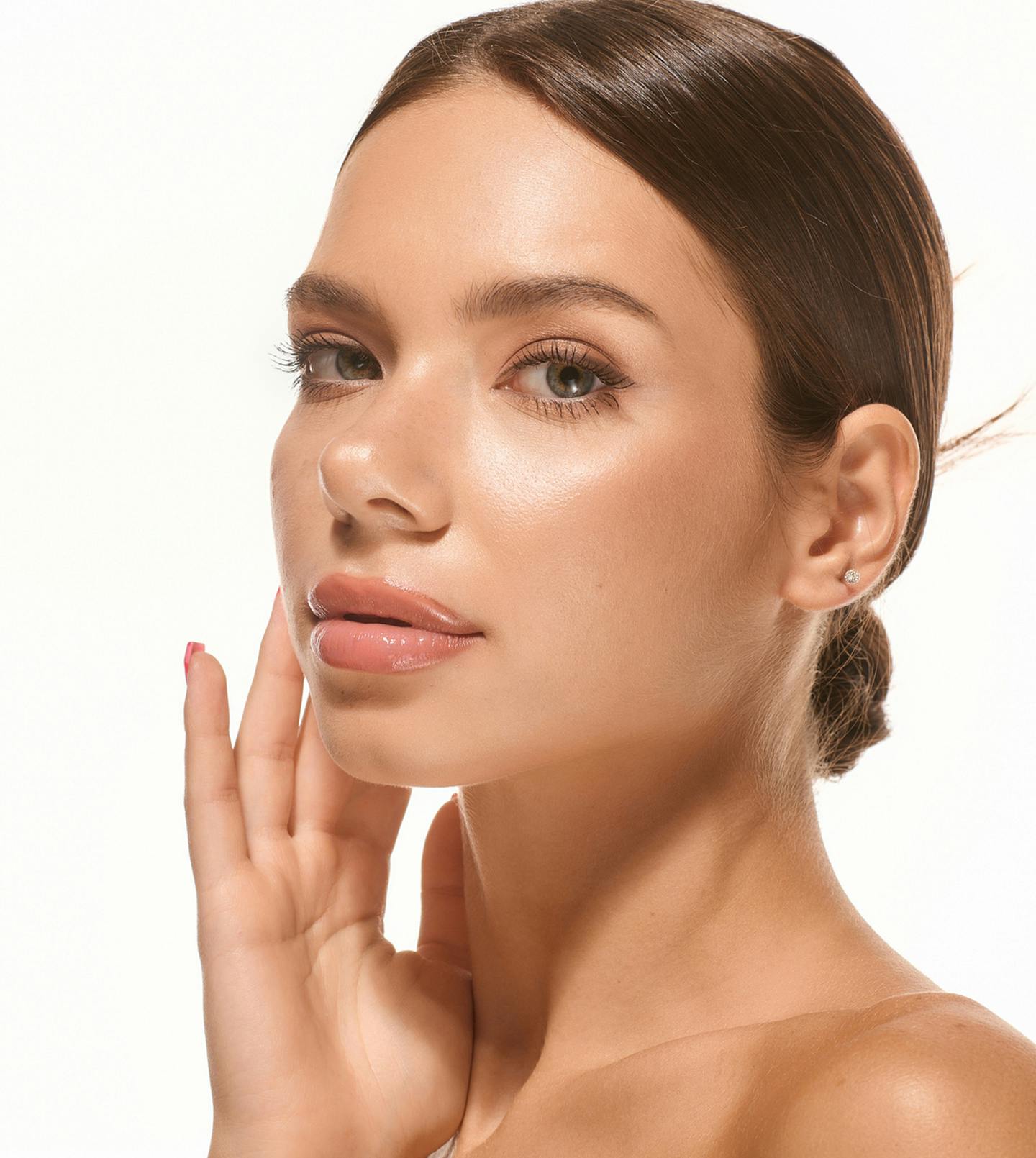 model holding her face