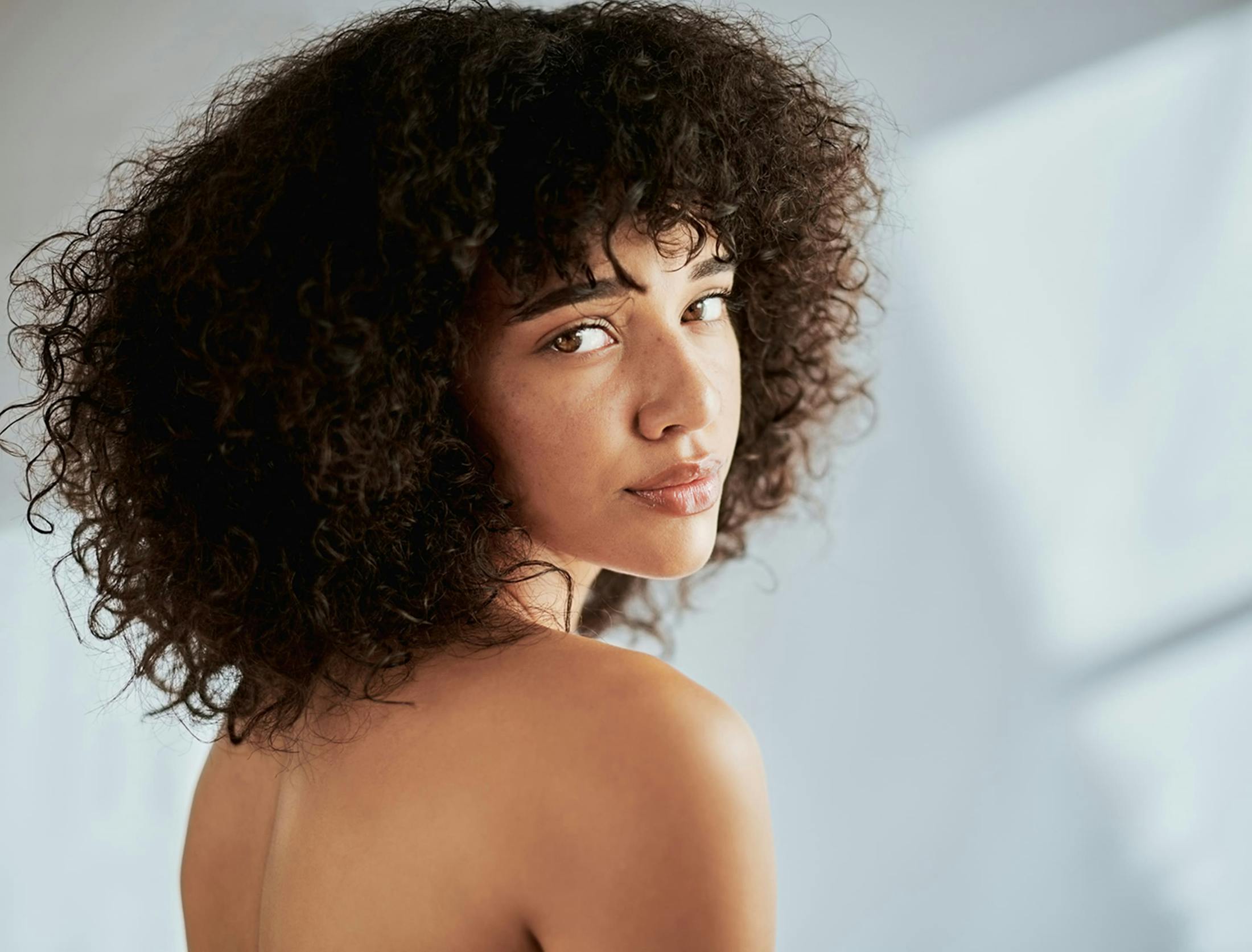 Woman looking over shoulder