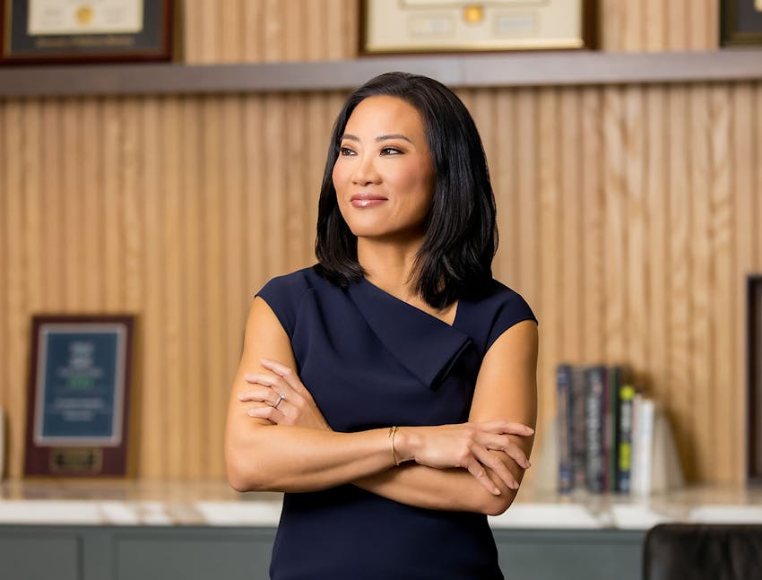 Dr. T with her arms crossed
