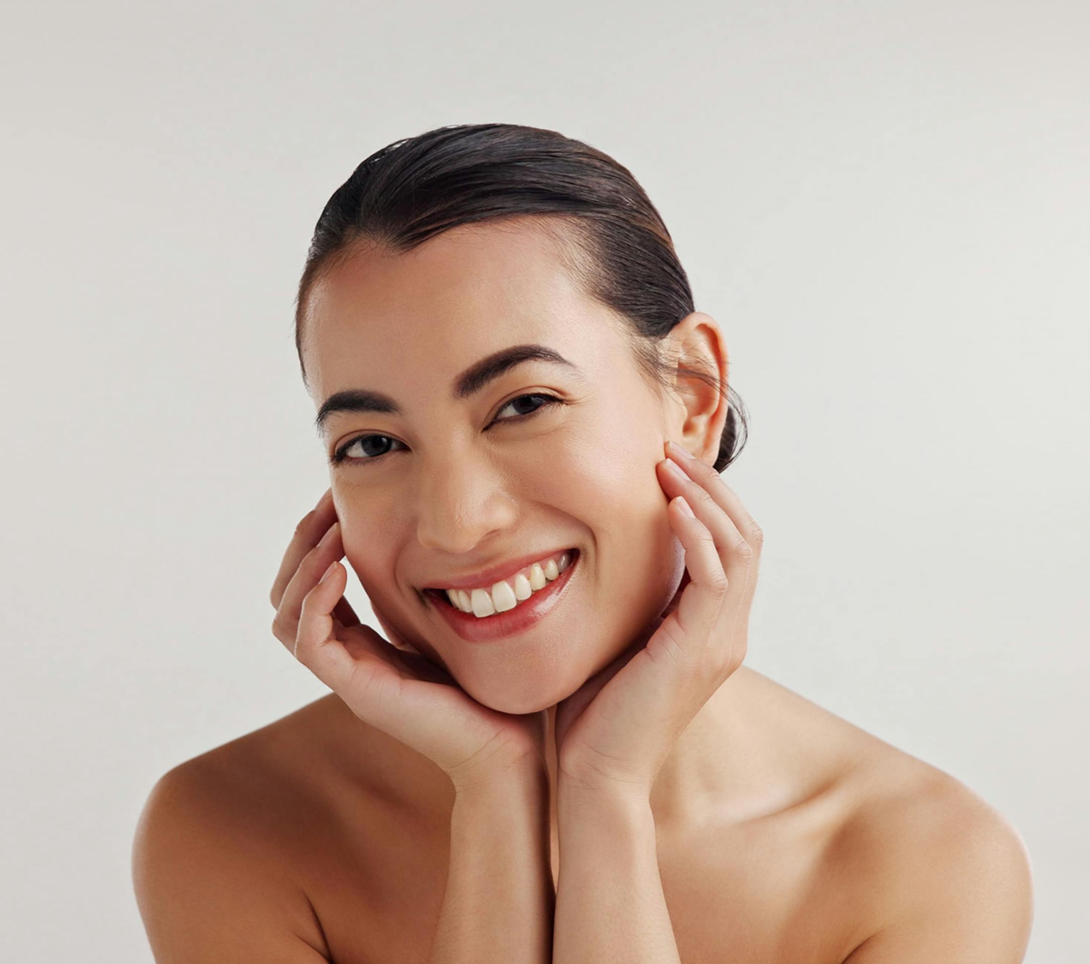 woman resting her chin on hands