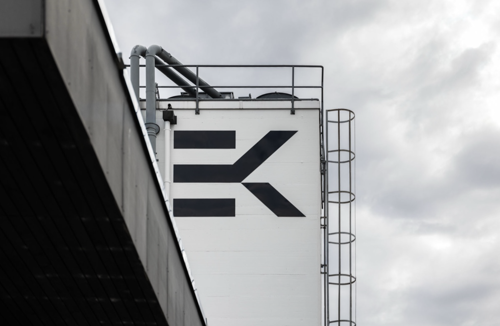 EK logo of Erich Keller AG on the facade of the company building