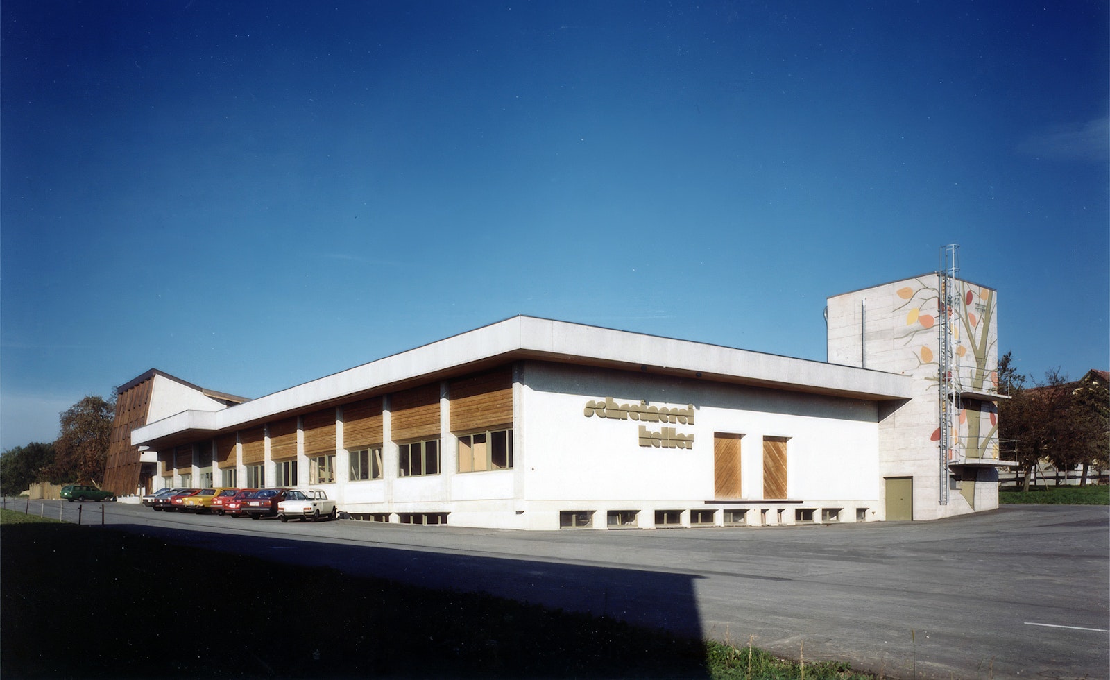 Schreinerei Keller company building with a painted tower, exterior view from 1981